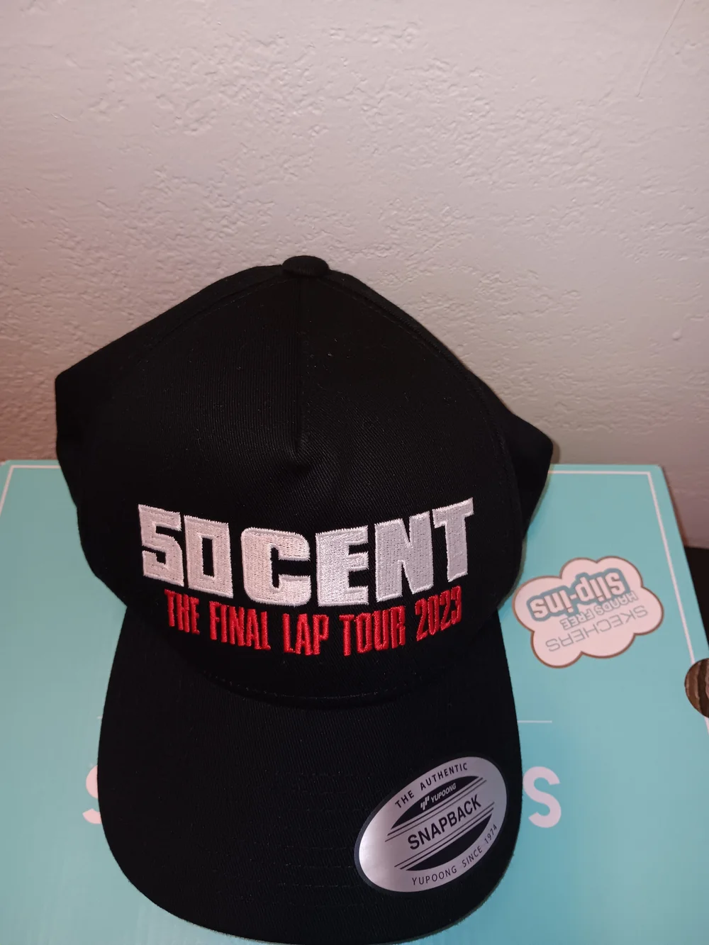 The Classic Black Snapback Hat with White and Red Embroidery
